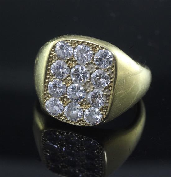 A late 1970s 18ct gold and pave set diamond tablet ring, size S/T.